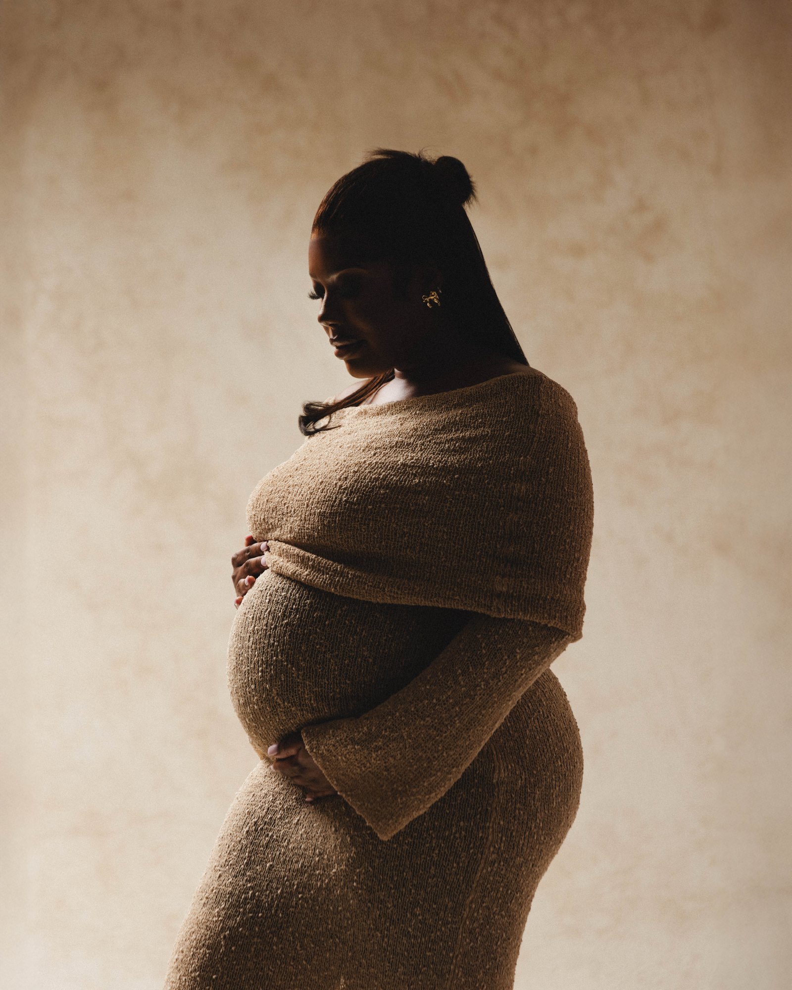 Maternity silhouette in a knit gown, Soba Maternity Dallas
